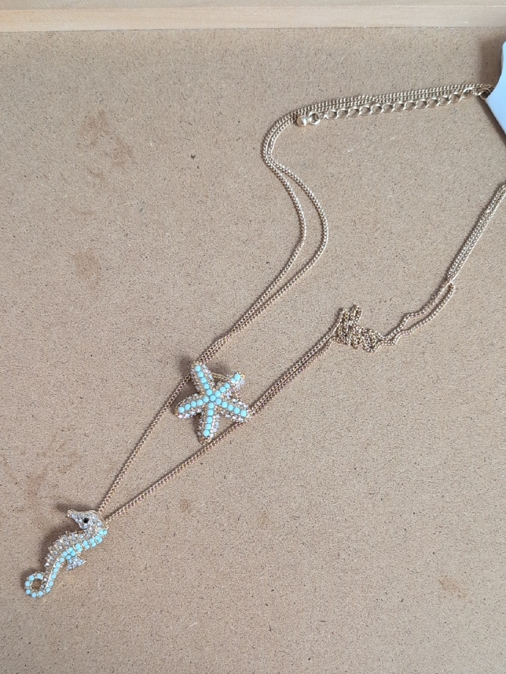 Gold-Tone Layered Starfish & Seahorse Necklace in Light Blue